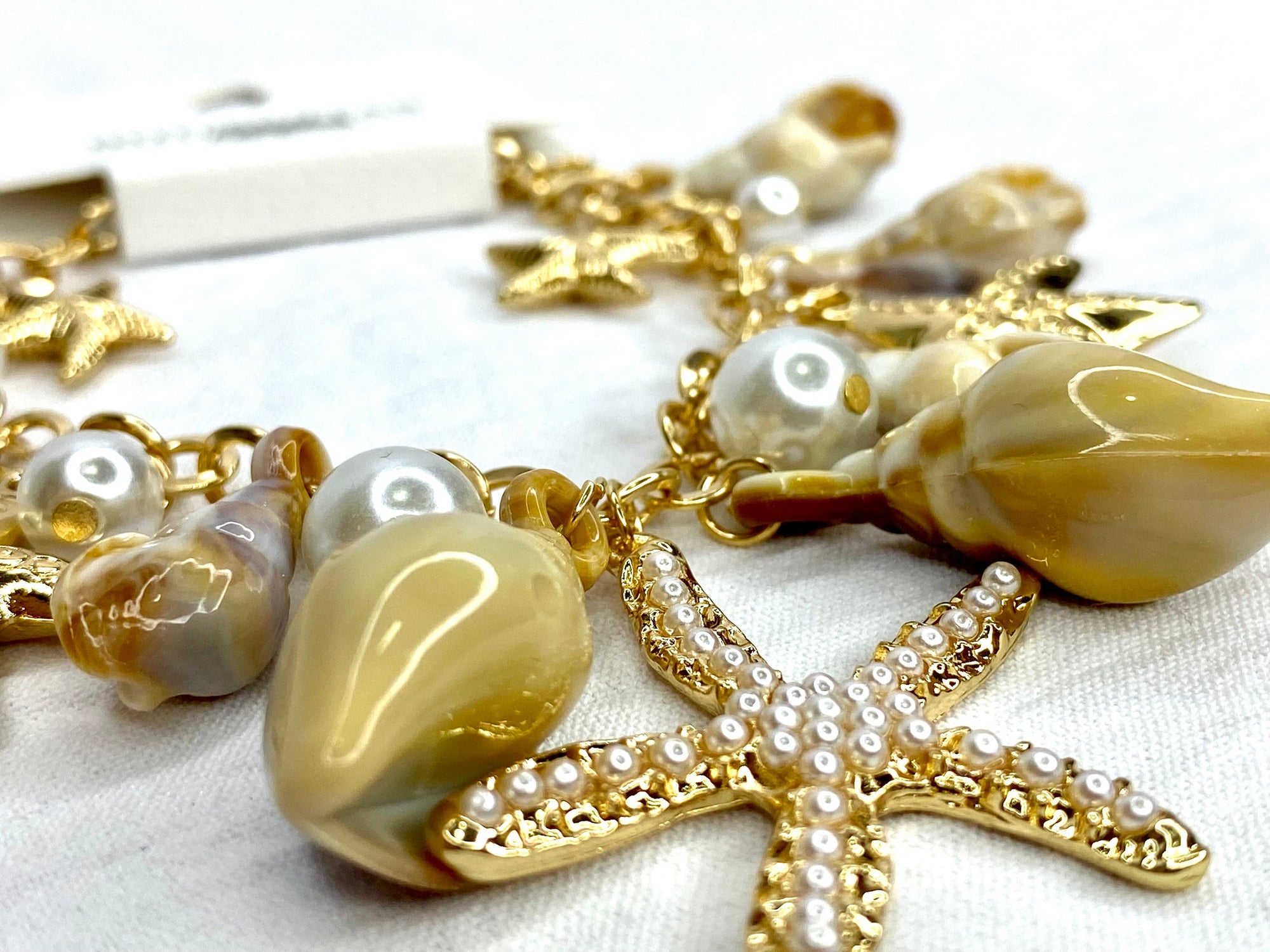 Pulsera mujer estrellas de mar y conchas marinas by Brasil