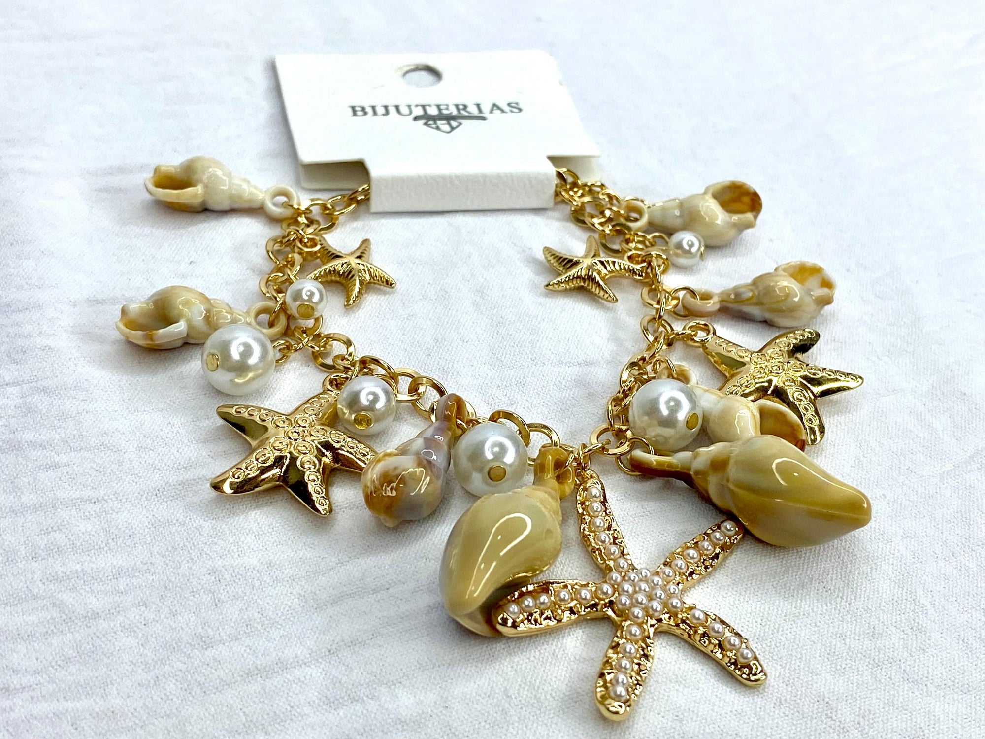 Pulsera mujer estrellas de mar y conchas marinas by Brasil