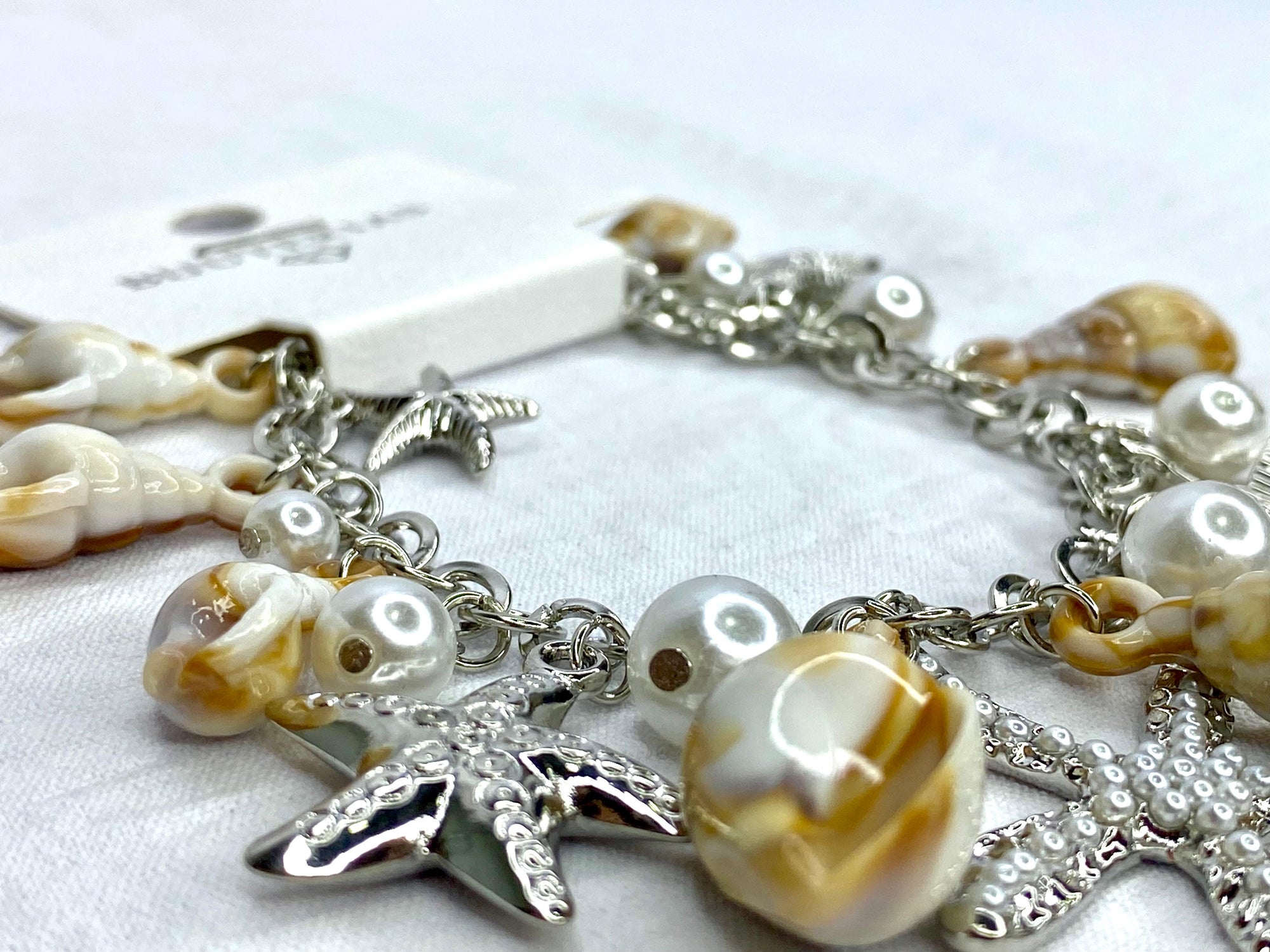 Pulsera mujer estrellas de mar y conchas marinas by Brasil